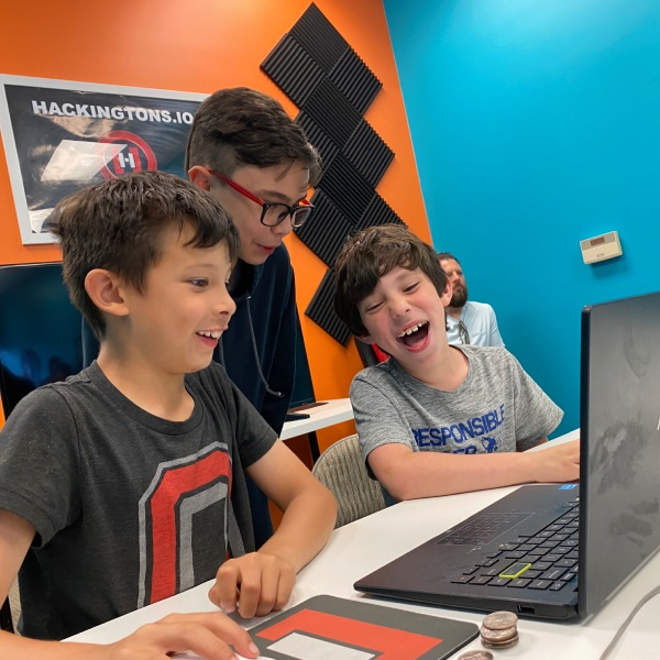 Students learning to code in classroom